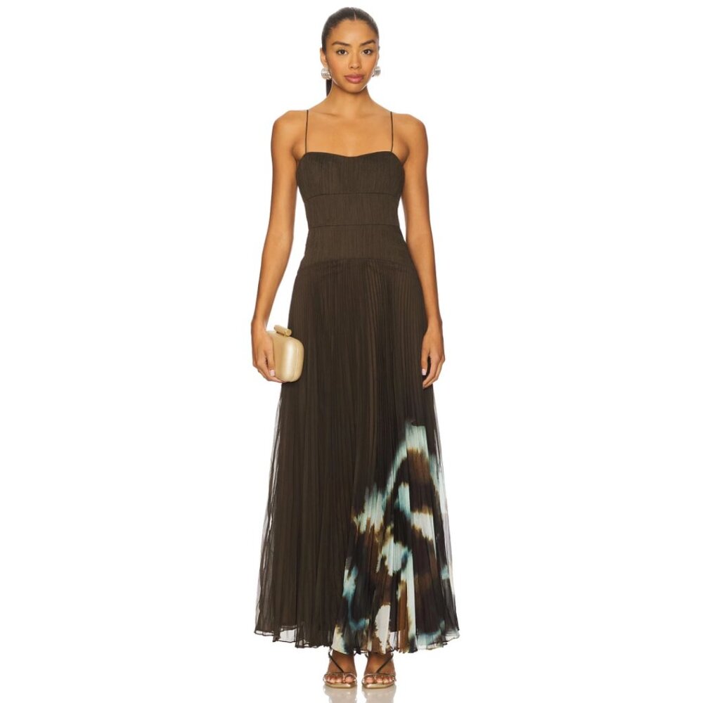 A pleated dress with Italian pasta-shaped fasteners